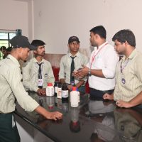 Teachers guiding students during science practical, NEPS, Patna, 2025