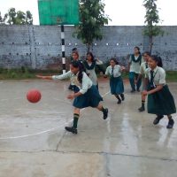 Students playing basketball at New Era Public School Patna, 2025