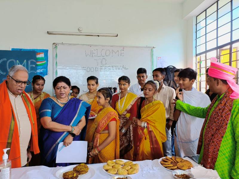 Students showcasing regional dishes during Food Festival at NEPS Patna