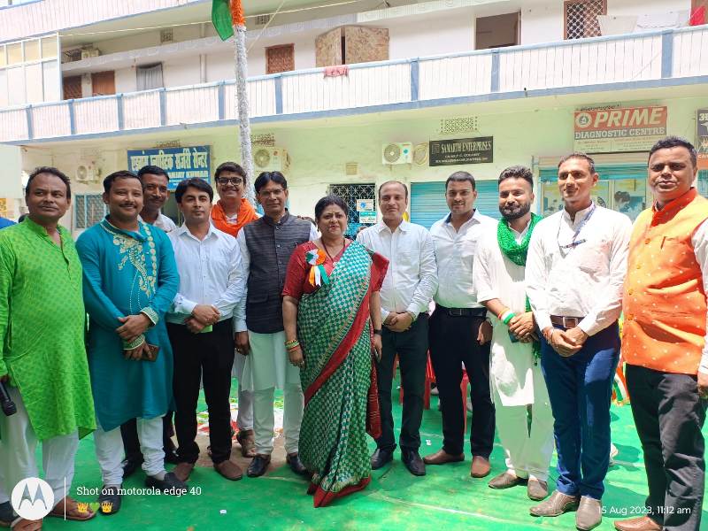 Principal hoisting the national flag on Independence Day at New Era Public School