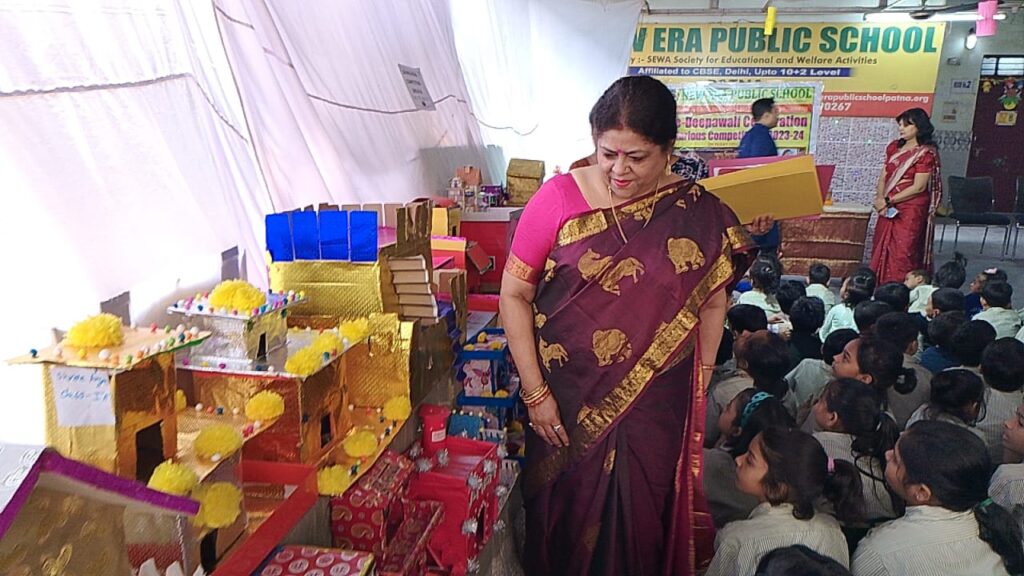 Principal participating in Pre-Diwali competition event at New Era Public School