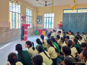 Students presenting speech on Guru Nanak Jayanti at NEPS Patna