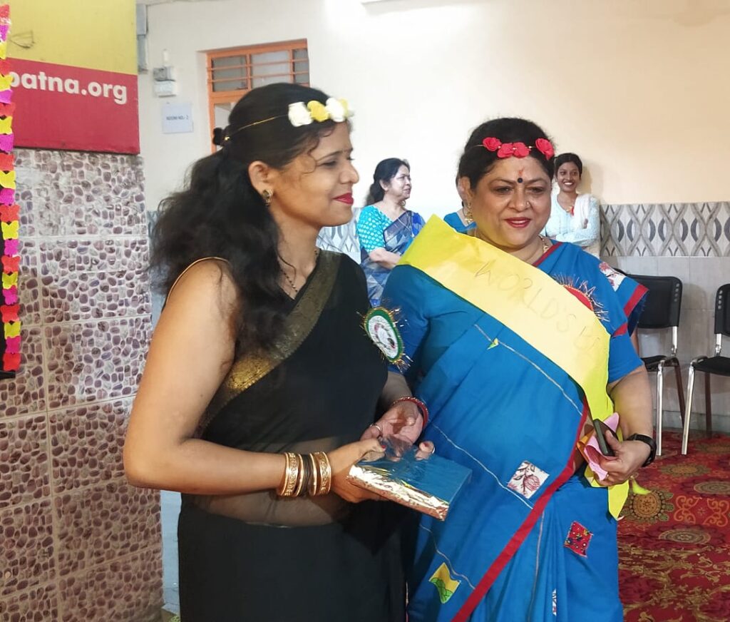 Principal participating in Mother’s Day celebration at school