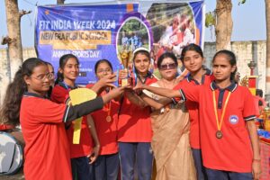 Winners posing with principal at Fit India Week Annual Sports Meet 2024–25. NEPS, Patna
